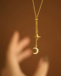 Gold star and moon lariat necklace