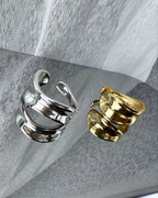 Mirror-polished asymmetric statement ring